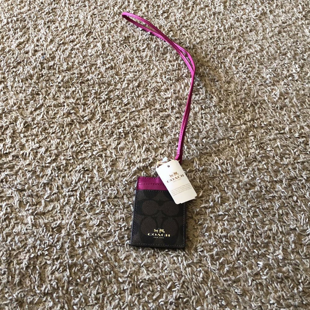 Coach brown and pink ID badge holder